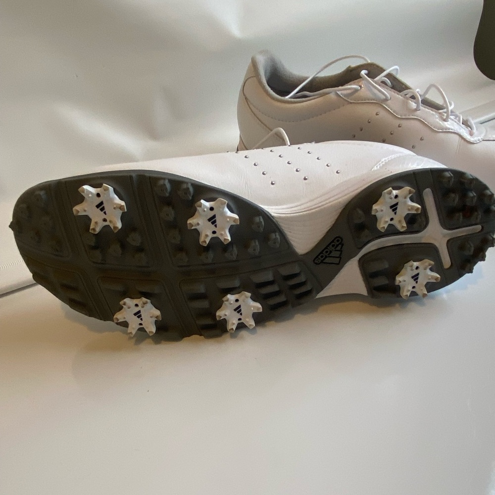 Women’s size 10 adidas golf shoe. White and gray featuring silver metal rivets